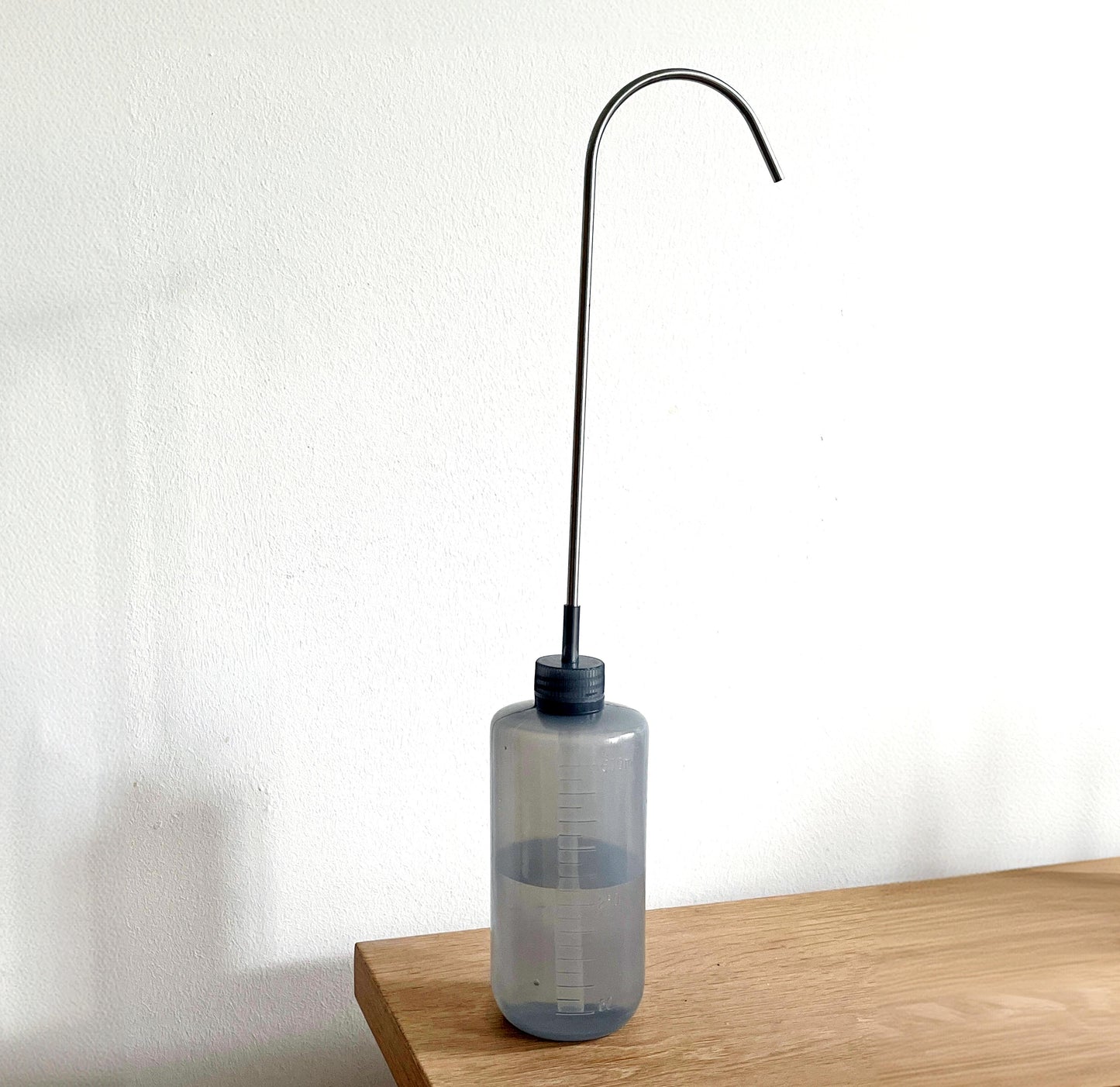 Watering tool for hanging plants